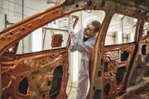 UK growth slows to 0.1% as car production slump drags economy ahead of budget